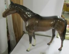 A large ceramic horse, not marked.