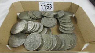 Approximately 700 grams silver half crowns.