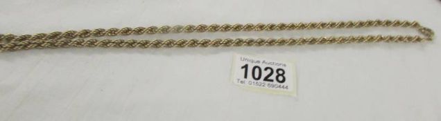 A 9ct gold 60 cm chain, 16.9 grams.
