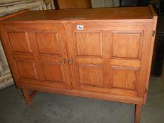 A pine sideboard with paneled doors, COLLECT ONLY.