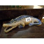 A pottery figure of a crocodile