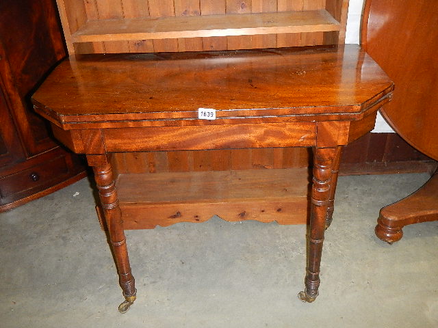 A Victorian mahogany fold over card table, COLLECT ONLY.