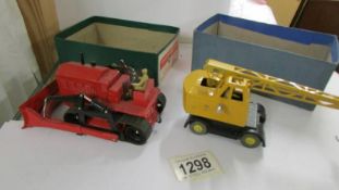 A Dinky 571 x 561 Coles mobile crane and a Blaw Knox bull dozer with box lids but no box bottoms.