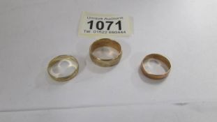 Three 9ct gold wedding rings, sizes L. M half and P, 8.8 grams.