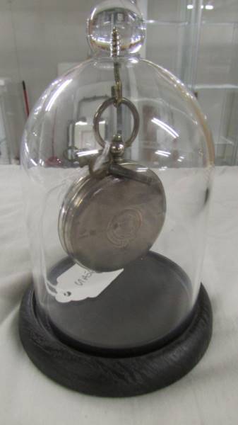 A silver pocket watch in plastic dome stand. - Image 2 of 2