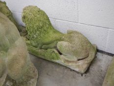 A pair of reclining lions, COLLECT ONLY.