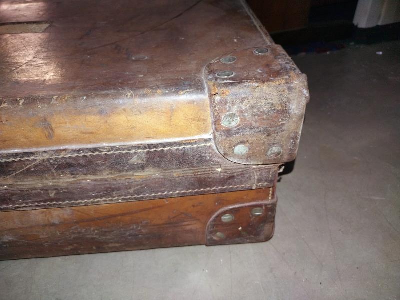 A large early leather suitcase (missing brass plaque on lid) - Image 9 of 10