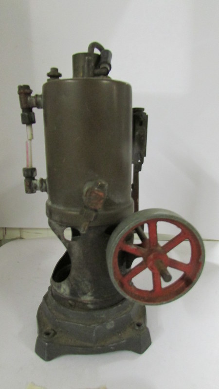 An early 20th-century Bing upright live steam engine.