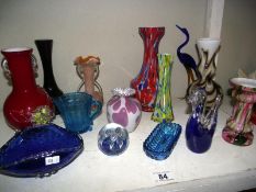 A good selection of coloured art glass vases and dishes