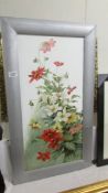 A framed floral painting on opaque glass, 84 x 47 cm.