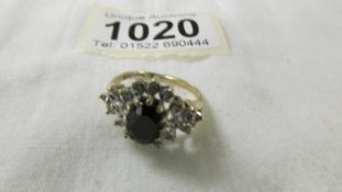 A yellow gold diamond and sapphire ring, size K, 3.2 grams (Hallmark indistinguishable)