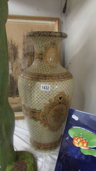 An oriental hand decorated vase, 61 cm tall. COLLECT ONLY.