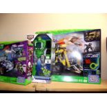 2 sealed teenage Mutant Ninja Turtles mega blocks sets and a Transformers rescue bots COLLECT ONLY