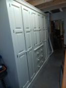 A large white finished solid pine combination wardrobe (245cm x 59cm x 212cm high) COLLECT ONLY