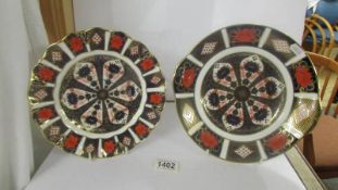 Two Royal Crown Derby Old Imari pattern plates.