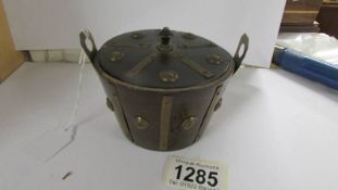 An unusual novelty treen tea caddy in the form of a barrel, circa 1900.