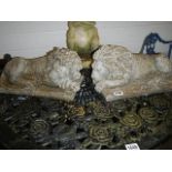 A pair of garden lion ornaments. COLLECT ONLY.