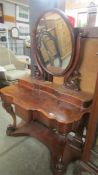 A mahogany Duchy style dressing table, COLLECT ONLY.