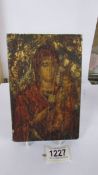 An antique hand painted icon on wood, 28.5 x 12 cm.