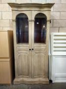 A fabulous Serpentine front French style drinking/display cabinet with weathered finish & extra