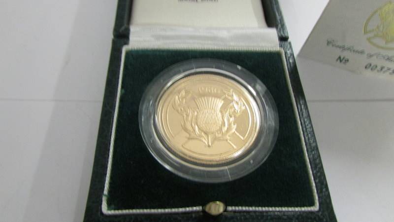 A 22ct gold 1986 £2 coin, No,00375. - Image 2 of 3