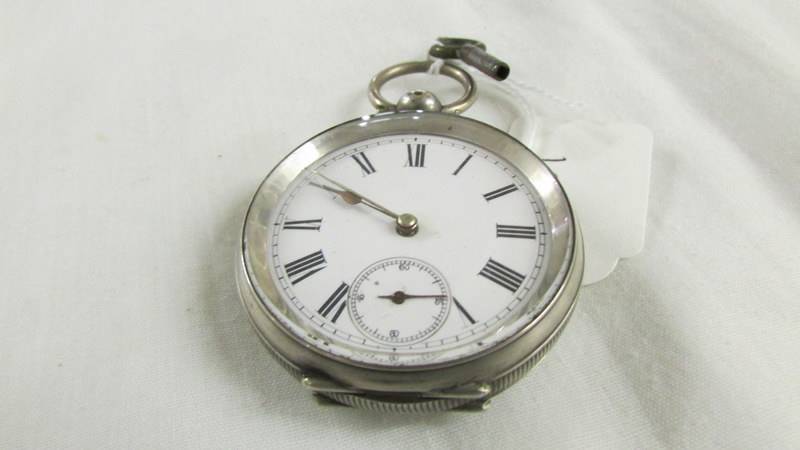 A silver pocket watch on stand (not working). - Image 2 of 3