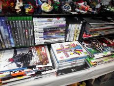 A selection of X-Box one, PlayStation PS4, PS3 and Nintendo DS games and a quantity of gaming