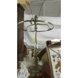 A brass table lamp, no shade. COLLECT ONLY.