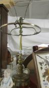 A brass table lamp, no shade. COLLECT ONLY.