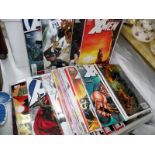 Approximately 42 Marvel comics, mainly X-Men and Avengers and a comic box, COLLECT ONLY