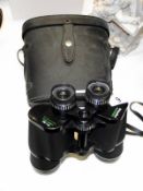 A pair of cased Prinzlux binoculars
