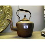 A Victorian copper kettle