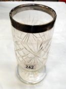 A Victorian cut glass vase with silver hall marked rim