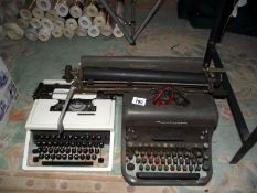 2 vintage typewriters, a Remington and an Olivetti (no cases for either)