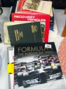 A selection of hardback books, including Formula 1, Top Gear, Atlas, etc