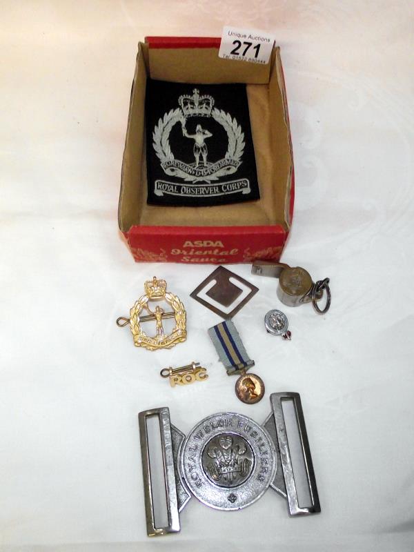 A Royal Welsh Fusiliers belt buckle and other military badges and patches