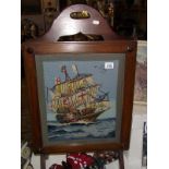 A 1930' to 50's oak framed wool work tapestry of a galleon fire screen, COLLECT ONLY