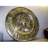 A large brass wall plaque diameter 61.5cm, COLLECT ONLY