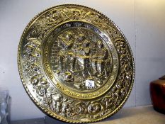 A large brass wall plaque diameter 61.5cm, COLLECT ONLY