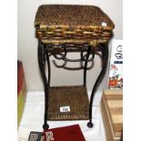 A wrought iron and wicker plant stand, height 41cm, top 21cm x 21cm COLLECT ONLY