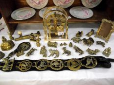 A quantity of brass including horse brasses, animals, bells etc