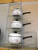 A vintage saucepan stand and set of 3 saucepans with lids, COLLECT ONLY
