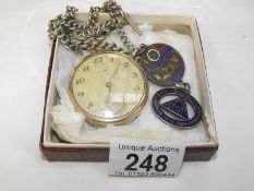 A Tempo gold plated gents pocket watch which has 2 fobs,1 being silver.
