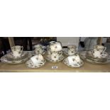A 28 piece vintage tea set decorated with roses