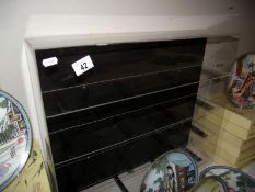 A Perspex display cabinet, size; 60cm x 14cm, height 50cm, COLLECT ONLY
