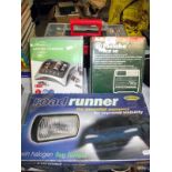 A pair of odd car driver lights in wrong box, 2 battery chargers and a tool box of electrical tools,