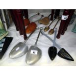 A selection of vintage shoe stretchers, 4 pairs and one single