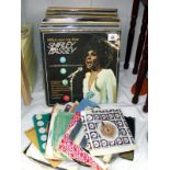 A quantity of LP's and 45's records, including Beach Boys, Rod Stewart, Eagles, Paul McCartney,