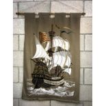 A large framed tapestry of a galleon sailing ship, 78cm x 120cm, COLLECT ONLY