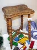 Early 20c oak stool with carved top and bobbin turned legs, height 45cm, COLLECT ONLY